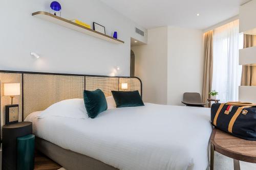 Habitación Triple Deluxe del hotel Le Friedland. Foto 6