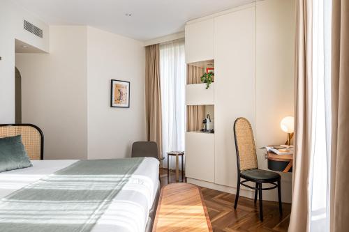 Habitación Triple Deluxe del hotel Le Friedland. Foto 7