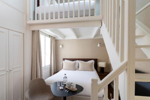 Habitación Cuádruple Dúplex del hotel Madeleine Haussmann. Foto 5