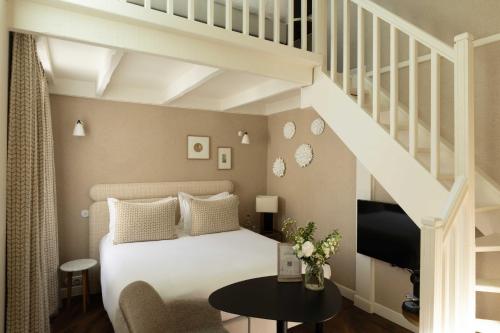 Habitación Cuádruple Dúplex del hotel Madeleine Haussmann. Foto 6