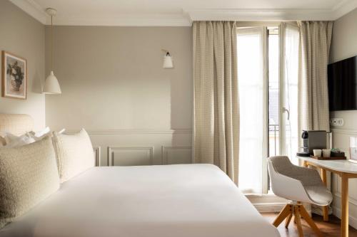 Habitación Doble Clásica - 1 o 2 camas del hotel Madeleine Haussmann. Foto 12