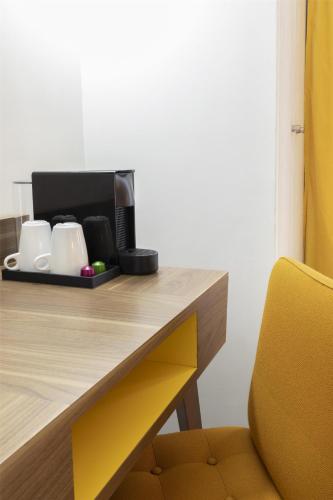Habitación Clásica con cama grande del hotel Best Western Plus 61 Paris Nation. Foto 4