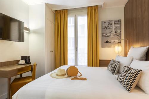 Habitación Clásica con cama grande del hotel Best Western Plus 61 Paris Nation. Foto 5