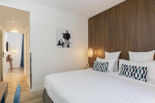 Suite Familiar del hotel Best Western Plus 61 Paris Nation. Foto 7