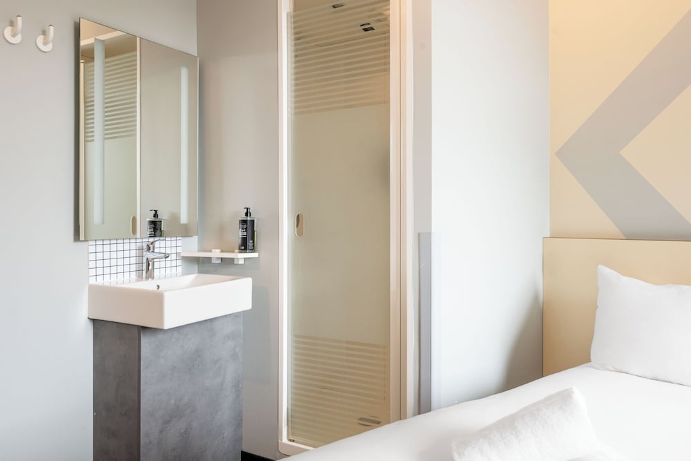 Habitación doble 2 Camas individuales del hotel Ibis Budget Leuven Centrum. Foto 4