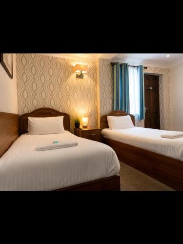 Habitación Doble - 2 camas del hotel Twickenham Guest House. Foto 3