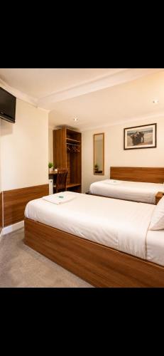 Habitación Doble - 2 camas del hotel Twickenham Guest House. Foto 4