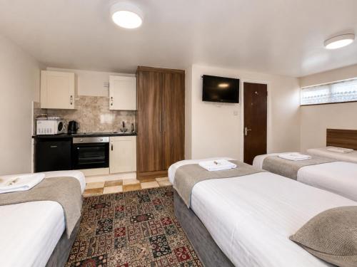 Habitación Cuádruple del hotel Twickenham Guest House