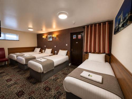 Habitación Cuádruple del hotel Twickenham Guest House. Foto 1