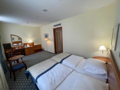 Habitación Doble Business del hotel Ramada By Wyndham Prague City Centre. Foto 7