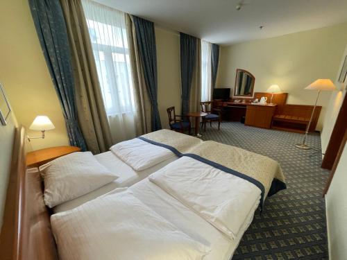 Habitación Doble Business del hotel Ramada By Wyndham Prague City Centre. Foto 8
