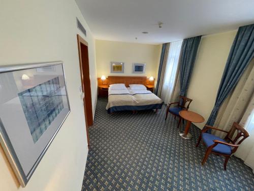 Habitación Doble Business del hotel Ramada By Wyndham Prague City Centre. Foto 9