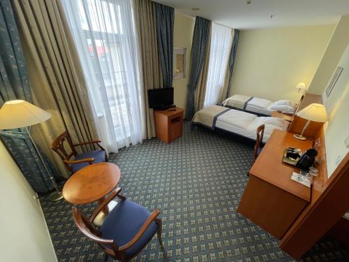Habitación Doble con terraza - 1 o 2 camas del hotel Ramada By Wyndham Prague City Centre. Foto 6