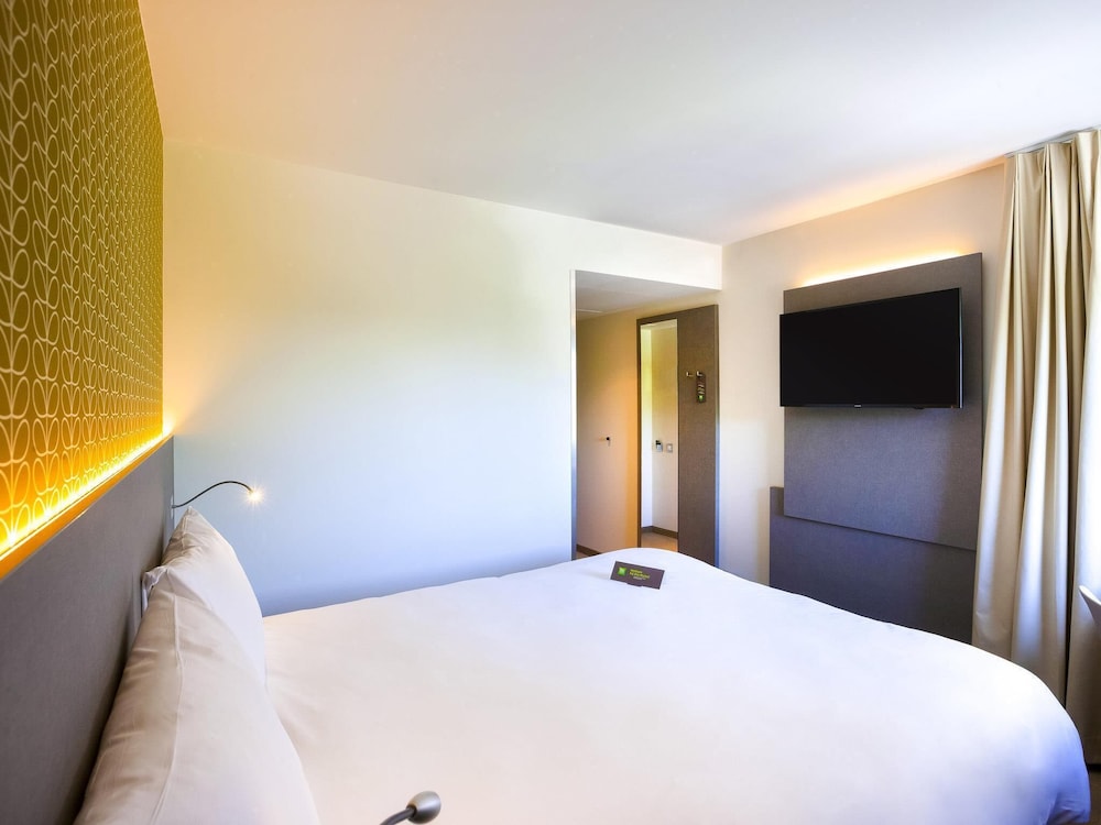 Habitación Standard con una cama doble del hotel Ibis Styles Kortrijk Expo. Foto 4