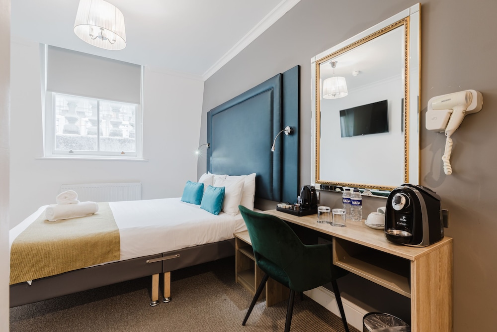 Habitación ejecutiva doble, baño privado del hotel The Porchester. Foto 11