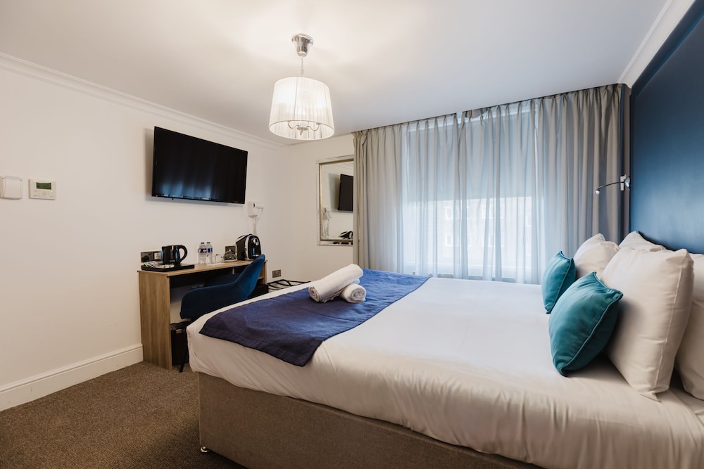 Habitación ejecutiva doble, baño privado del hotel The Porchester. Foto 15