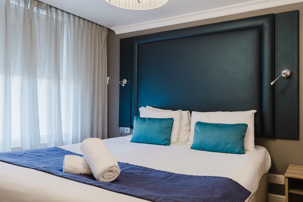 Habitación ejecutiva doble, baño privado del hotel The Porchester. Foto 18