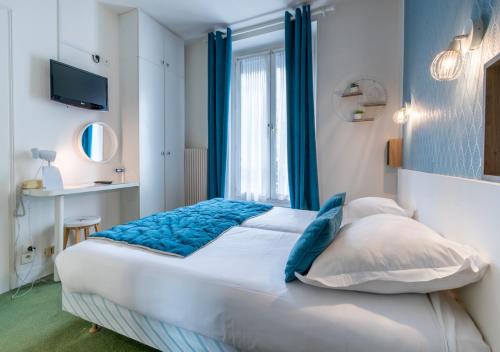 Habitación Doble Estándar - 2 camas del hotel Nouvel Paris. Foto 2