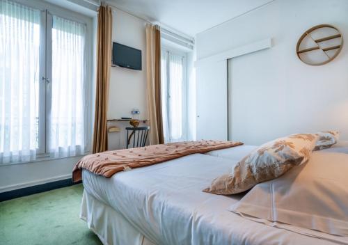 Habitación Doble Estándar - 2 camas del hotel Nouvel Paris. Foto 4
