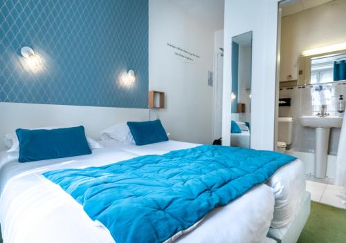 Habitación Doble Estándar - 2 camas del hotel Nouvel Paris. Foto 8