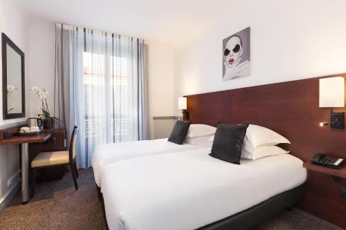 Habitación Clásica con cama grande del hotel Best Western Lakmi Nice. Foto 6