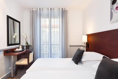 Habitación Clásica con cama grande del hotel Best Western Lakmi Nice. Foto 7