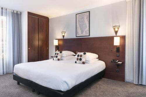 Habitación Deluxe con cama extragrande del hotel Best Western Lakmi Nice. Foto 10