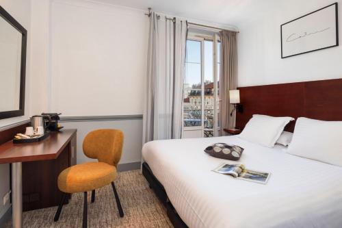 Habitación superior con balcón del hotel Best Western Lakmi Nice. Foto 4
