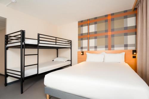 Family Quadruple room with Bunkbeds and shower del hotel Easyhotel Nice Palais Des Congrès – Old Town. Foto 3