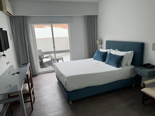 Habitación Doble Clásica del hotel Rali Viana. Foto 13