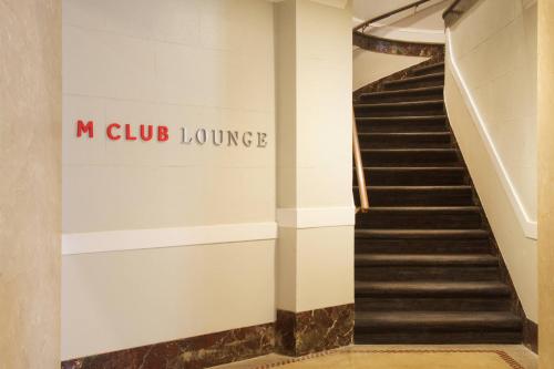 Habitación Club con cama extragrande del hotel Marriott Syracuse Downtown. Foto 5