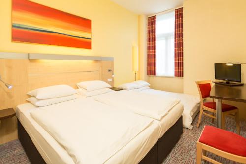 Habitación Familiar del hotel Exe City Park. Foto 1