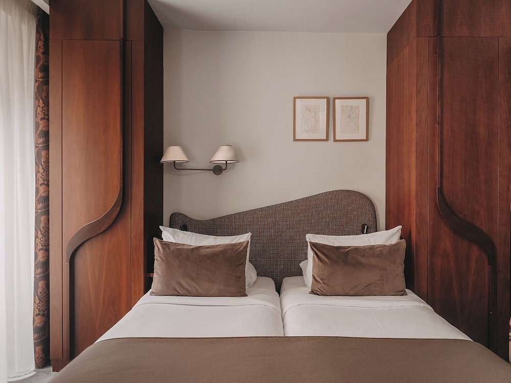 Habitación triple Deluxe del hotel Belloy Saint-germain