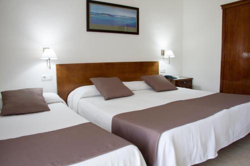 Habitación Doble con Cama supletoria del hotel Sicania