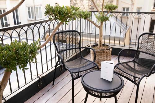 Suite con terraza del hotel Maison Elle Paris Etoile. Foto 1