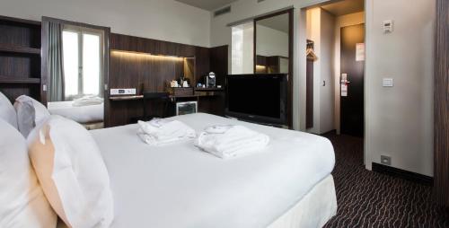 Habitación Doble Club del hotel Libertel Gare De L'est Francais. Foto 3