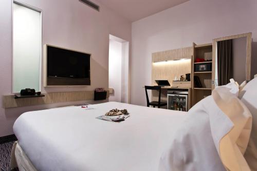 Habitación Doble Confort del hotel Libertel Gare De L'est Francais. Foto 1