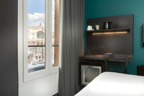 Habitación Doble Confort del hotel Libertel Gare De L'est Francais. Foto 2