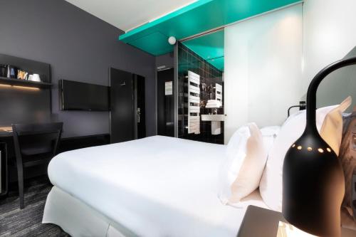 Habitación Doble Confort del hotel Libertel Gare De L'est Francais. Foto 3
