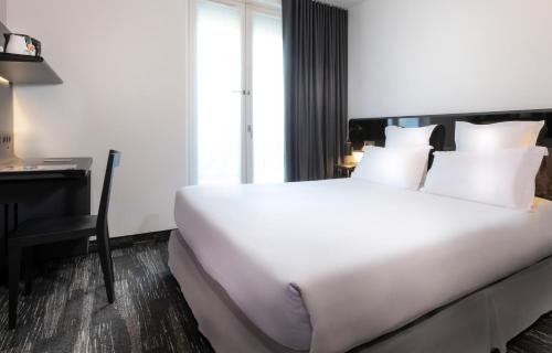 Habitación Doble Confort del hotel Libertel Gare De L'est Francais. Foto 4