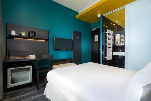 Habitación Doble Confort del hotel Libertel Gare De L'est Francais. Foto 6