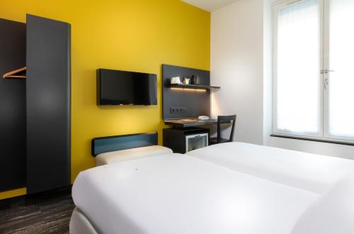 Habitación Doble Confort del hotel Libertel Gare De L'est Francais. Foto 7