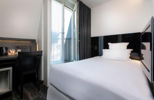 Habitación Individual acogedora del hotel Libertel Gare De L'est Francais. Foto 3