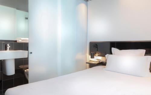 Habitación Individual acogedora del hotel Libertel Gare De L'est Francais. Foto 4