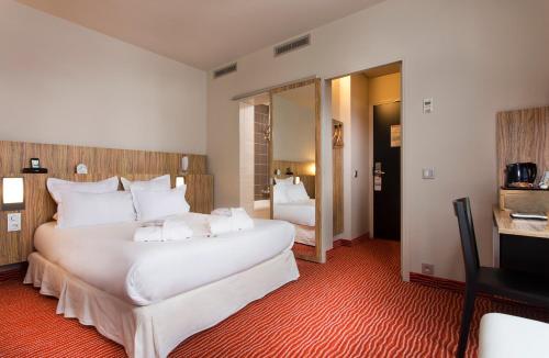 Habitación Familiar del hotel Libertel Gare De L'est Francais. Foto 3