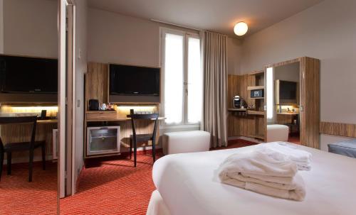 Habitación Familiar del hotel Libertel Gare De L'est Francais. Foto 4