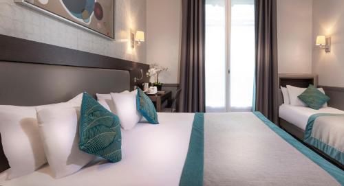 Habitación Triple del hotel Elysées Céramic