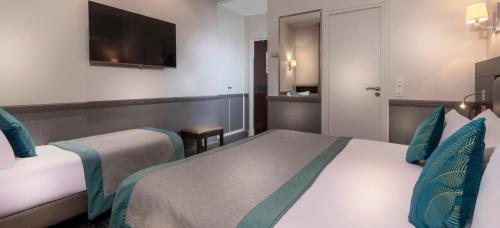 Habitación Triple del hotel Elysées Céramic. Foto 5
