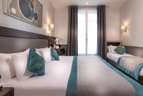 Habitación Triple del hotel Elysées Céramic. Foto 6