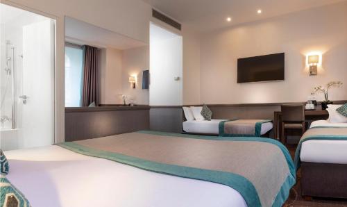 Habitación cuádruple del hotel Elysées Céramic